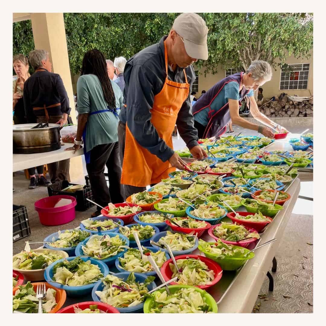 Healthy salad bar with fresh vegetables at community gathering, featuring a San Miguel Community Foundation Nonprofit Network Member organization.