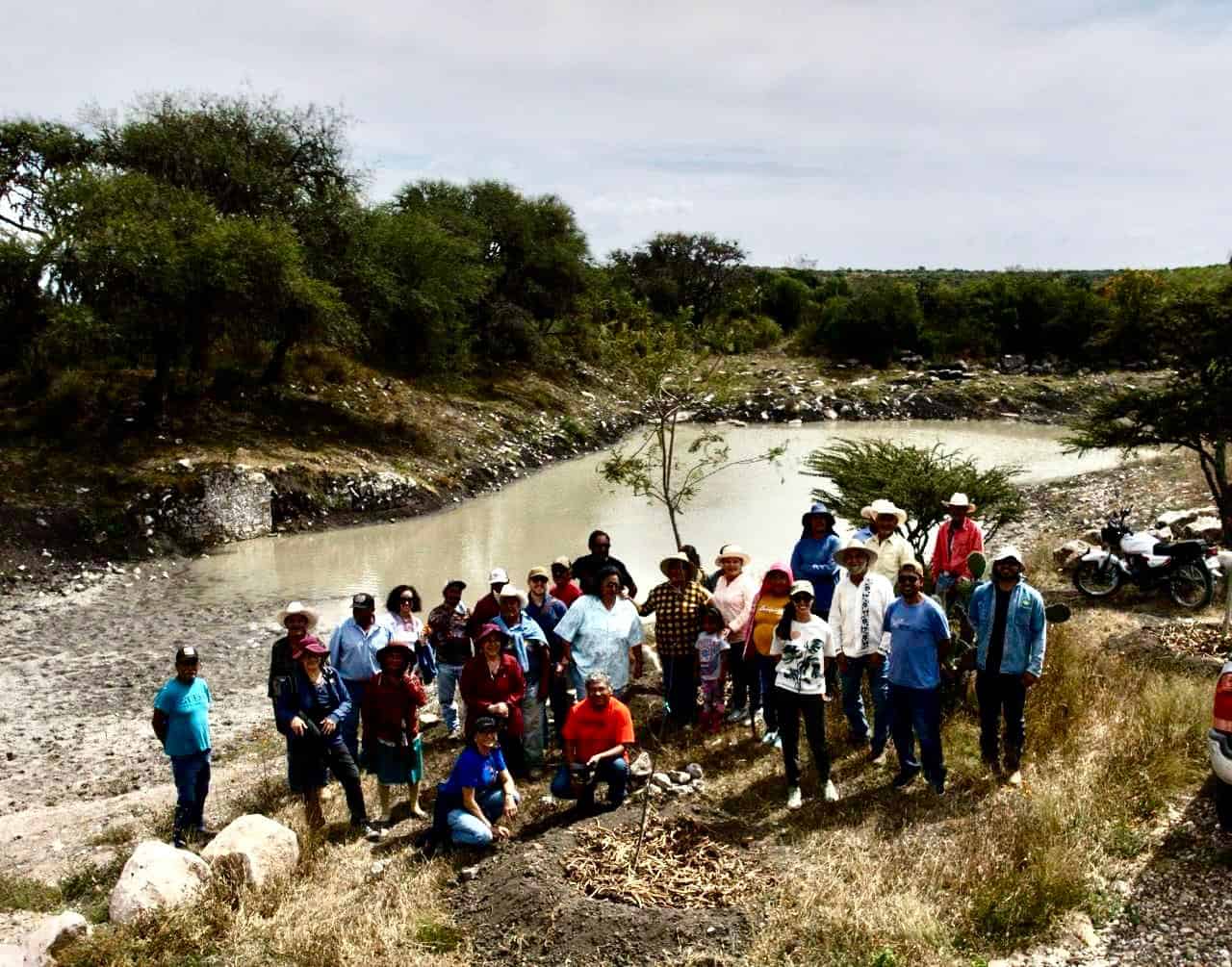 Community river cleanup, environmental conservation, Mexico.